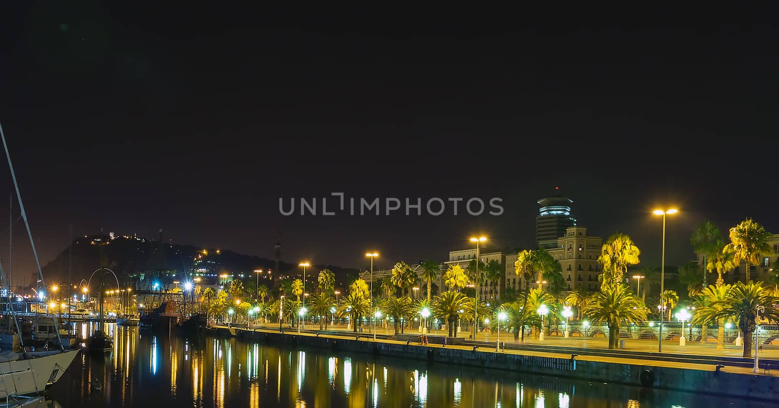 night city mountain Montjuic, Columbus Monument in Barcelona, Catalonia, Spain