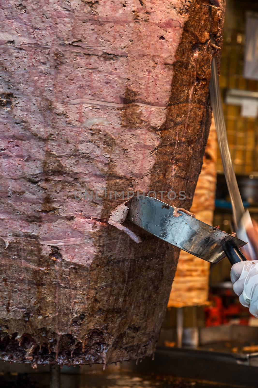 Turkish cuisine food Slicing doner kebab restaurant, moving to cut soft focus background