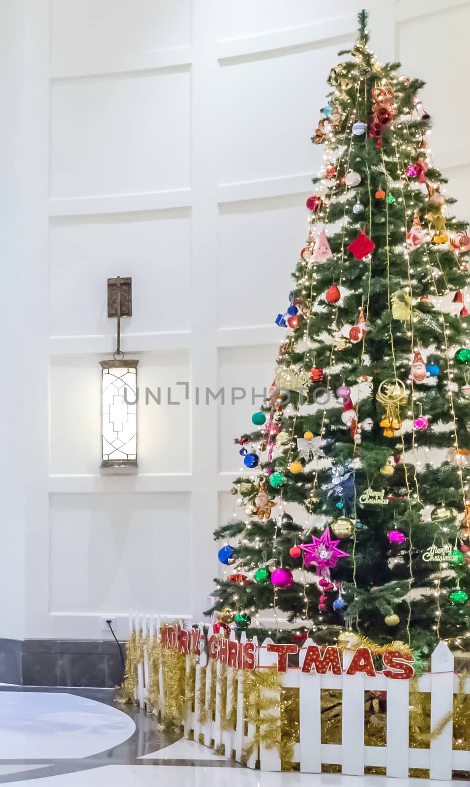 Christmas tree decorative balls gifts with ribbons bows, background blur textures soft focus