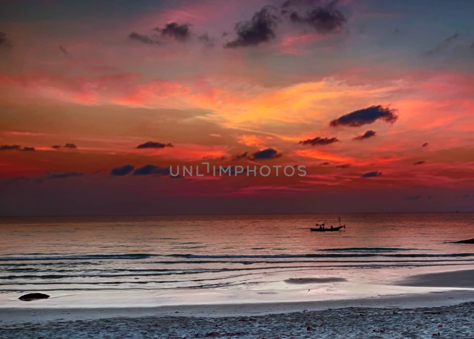 Small fishing boat in sea sunrise or sunset background abstract blur