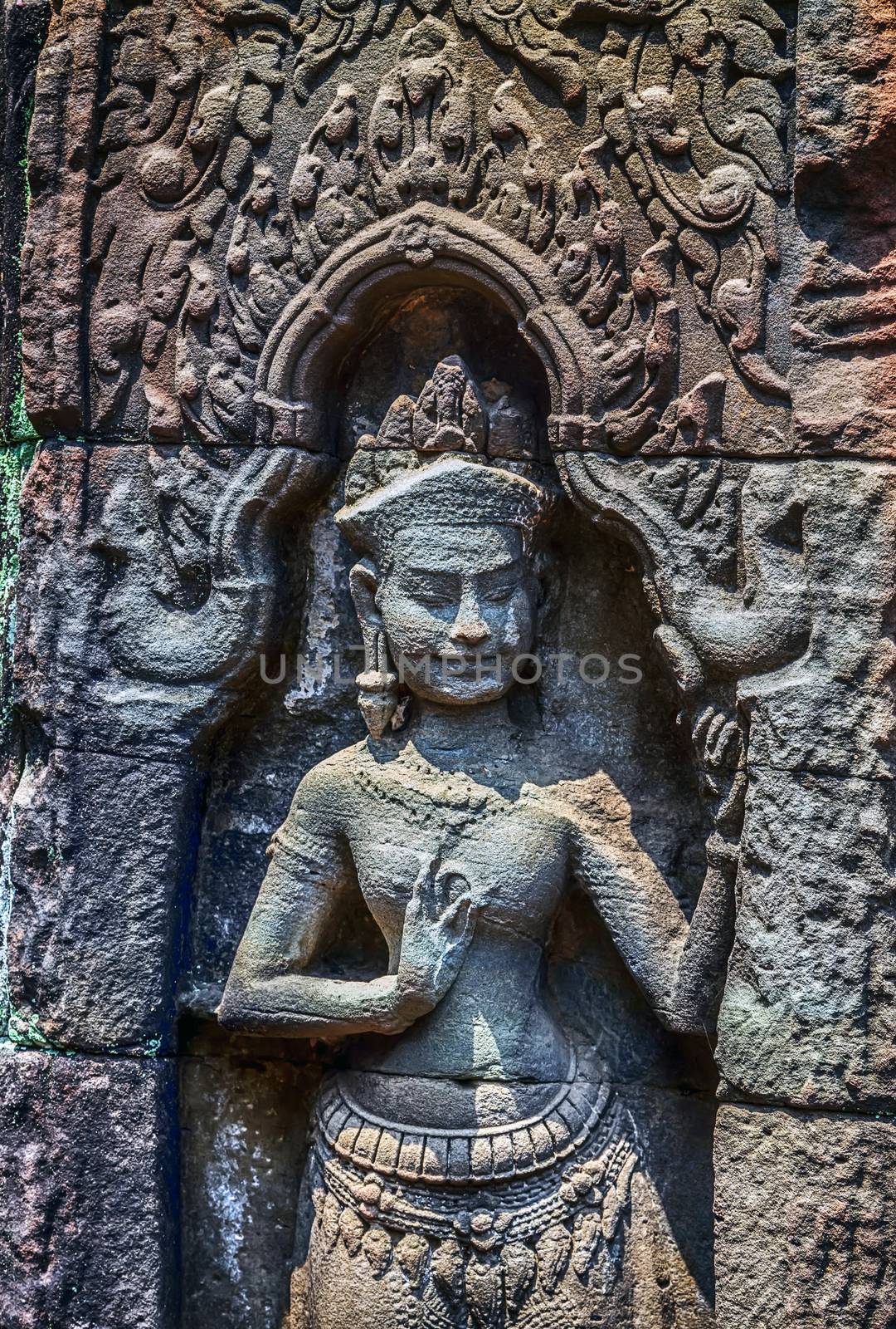 Carvings Apsara sculpture ruins temple Angkor Wat in Cambodia