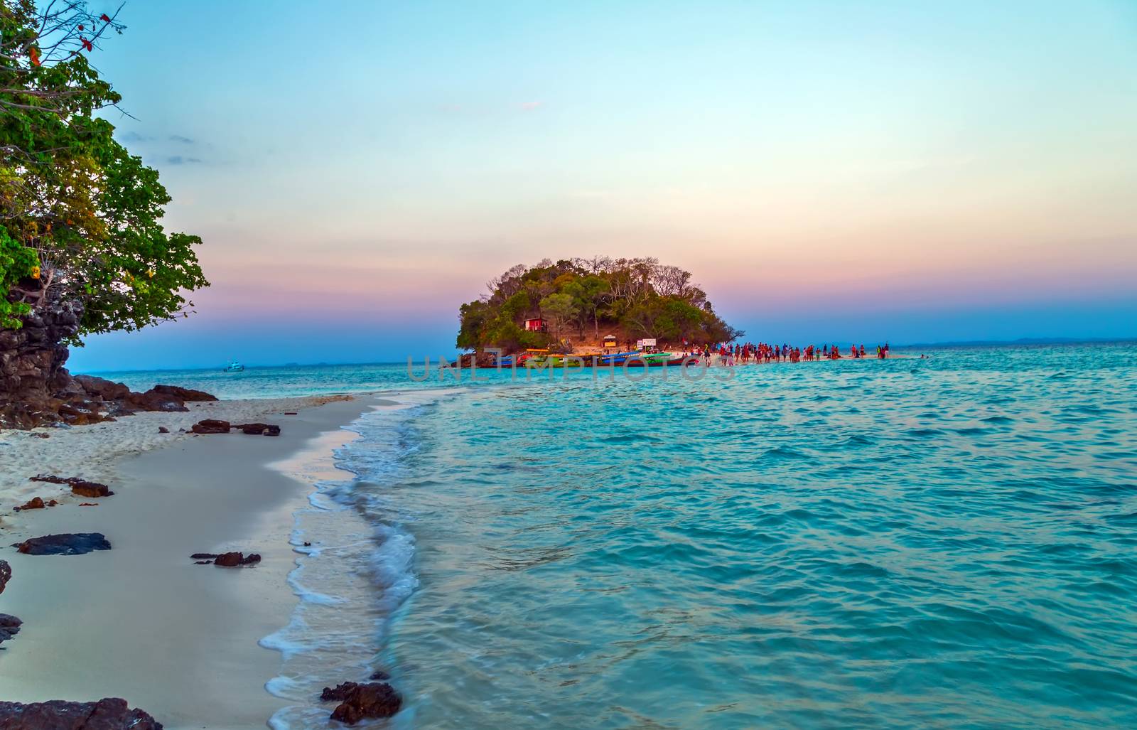 passenger boat and tourist on Beach, Thailand seascape holiday background concept tropical beaches Islands Andaman sea Krabi, South of Thailand.