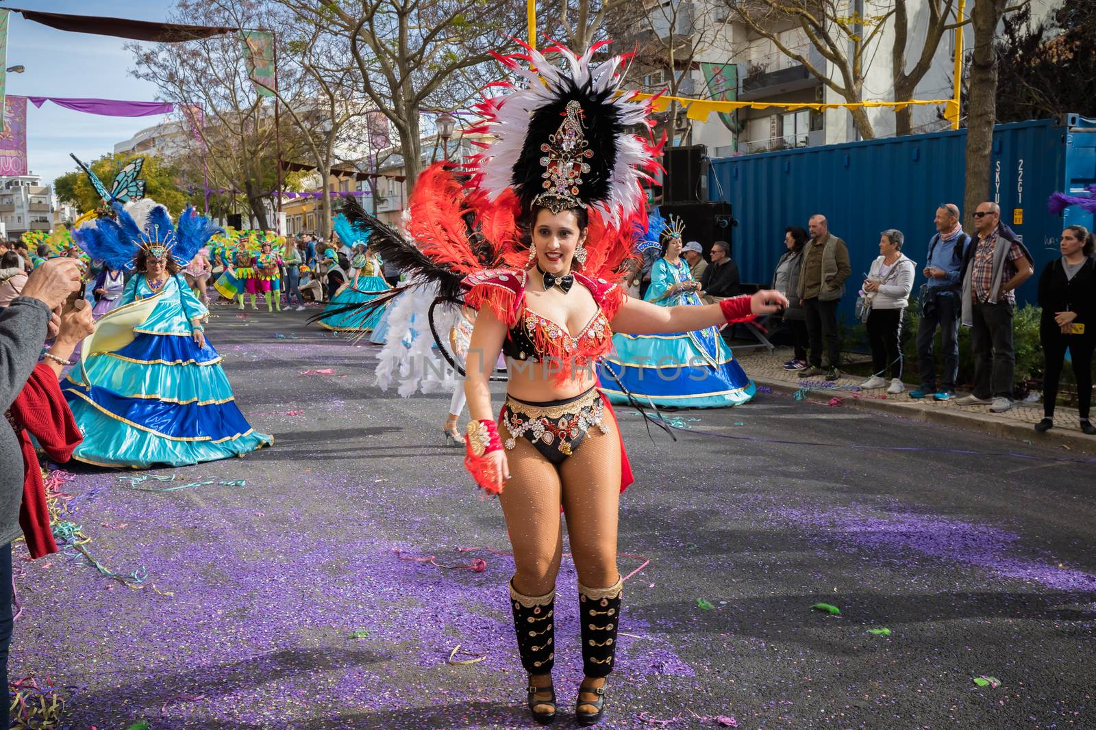 dancers parading in the street in carnival of Loule city, Portug by AtlanticEUROSTOXX