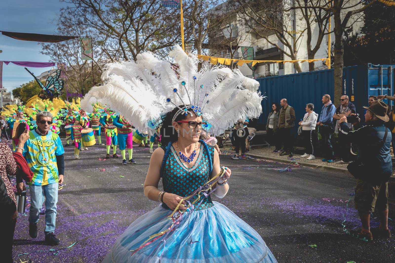 dancers parading in the street in carnival of Loule city, Portug by AtlanticEUROSTOXX