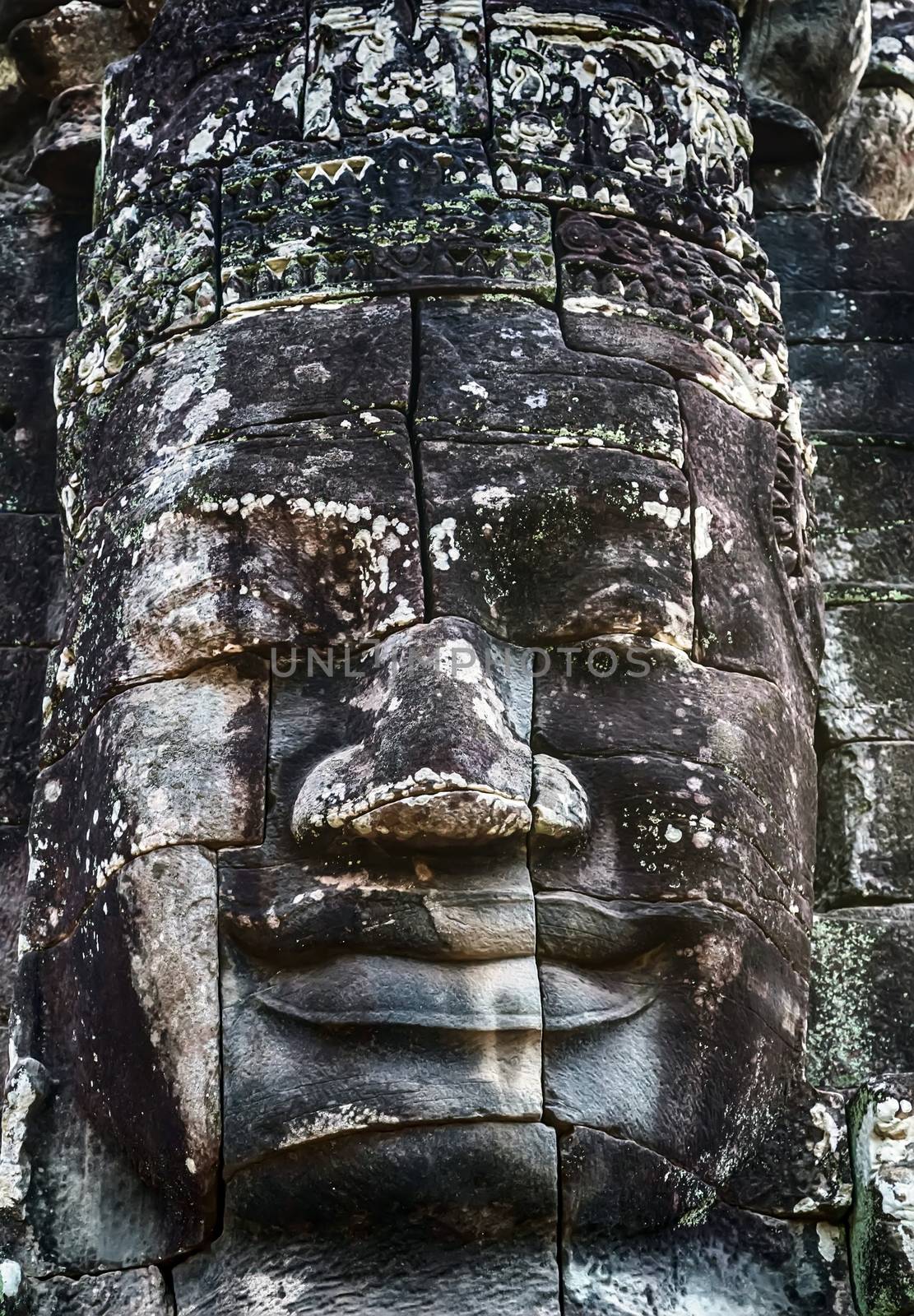 old stone face of prasat Bayon Temple Angkor Thom Cambodia.