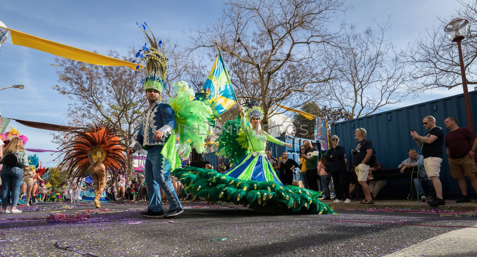 dancers parading in the street in carnival of Loule city, Portug by AtlanticEUROSTOXX