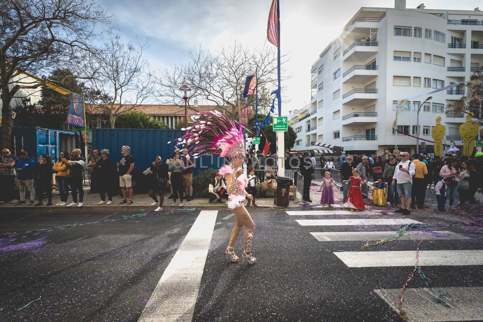 dancers parading in the street in carnival of Loule city, Portug by AtlanticEUROSTOXX