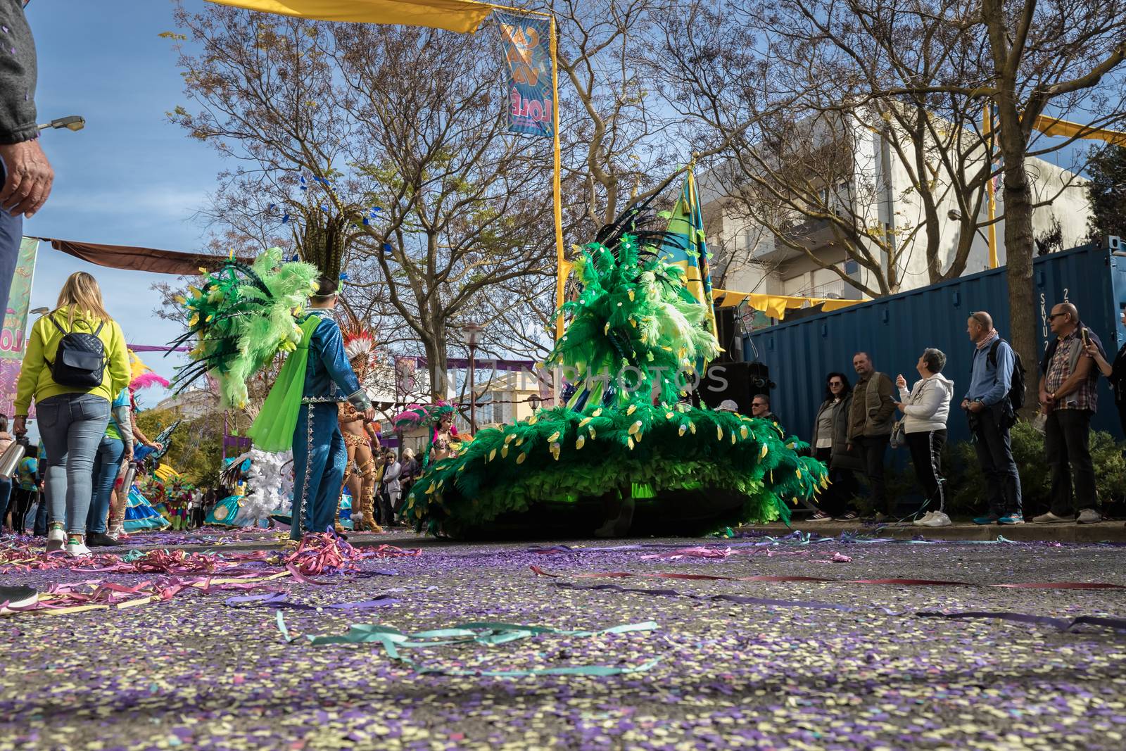 Loule, Portugal - February 25, 2020: dancers parading in the street in front of the public in the parade of the traditional carnival of Loule city on a February day