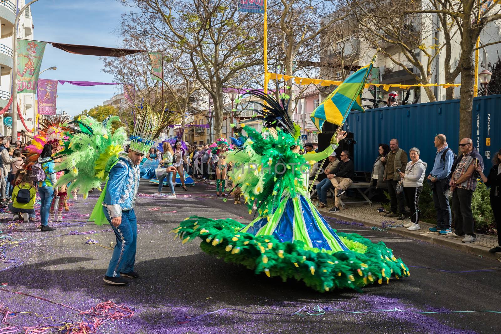 dancers parading in the street in carnival of Loule city, Portug by AtlanticEUROSTOXX