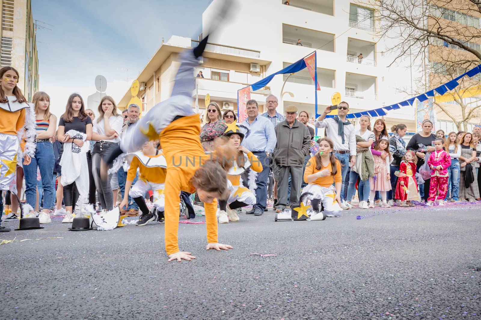 dancers parading in the street in carnival of Loule city, Portug by AtlanticEUROSTOXX