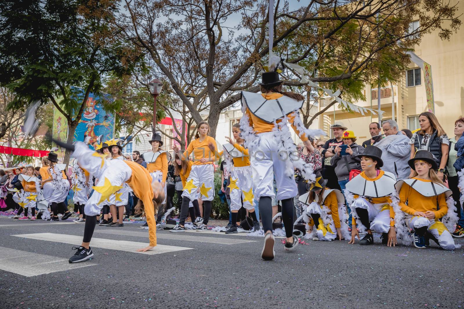 dancers parading in the street in carnival of Loule city, Portug by AtlanticEUROSTOXX