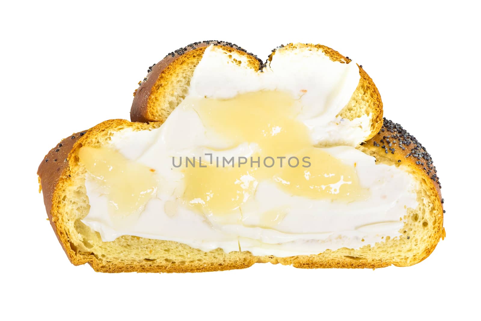 Top view of slice of challah bread with cottage cheese and honey by mkos83