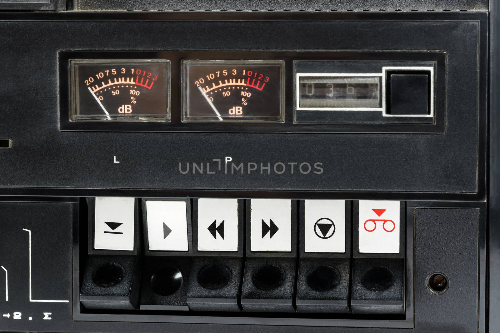 Closeup of control buttons of old audio tape recorder by mkos83