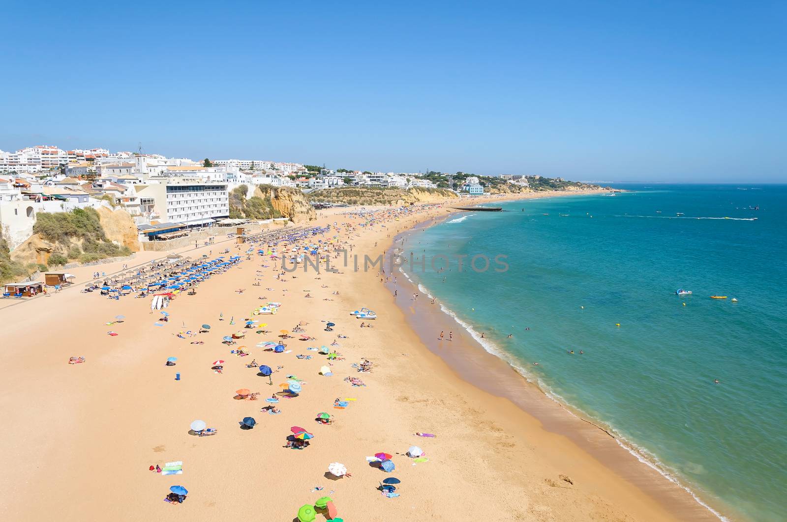 View of crowded beach in Albufeira, Algarve, Portugal