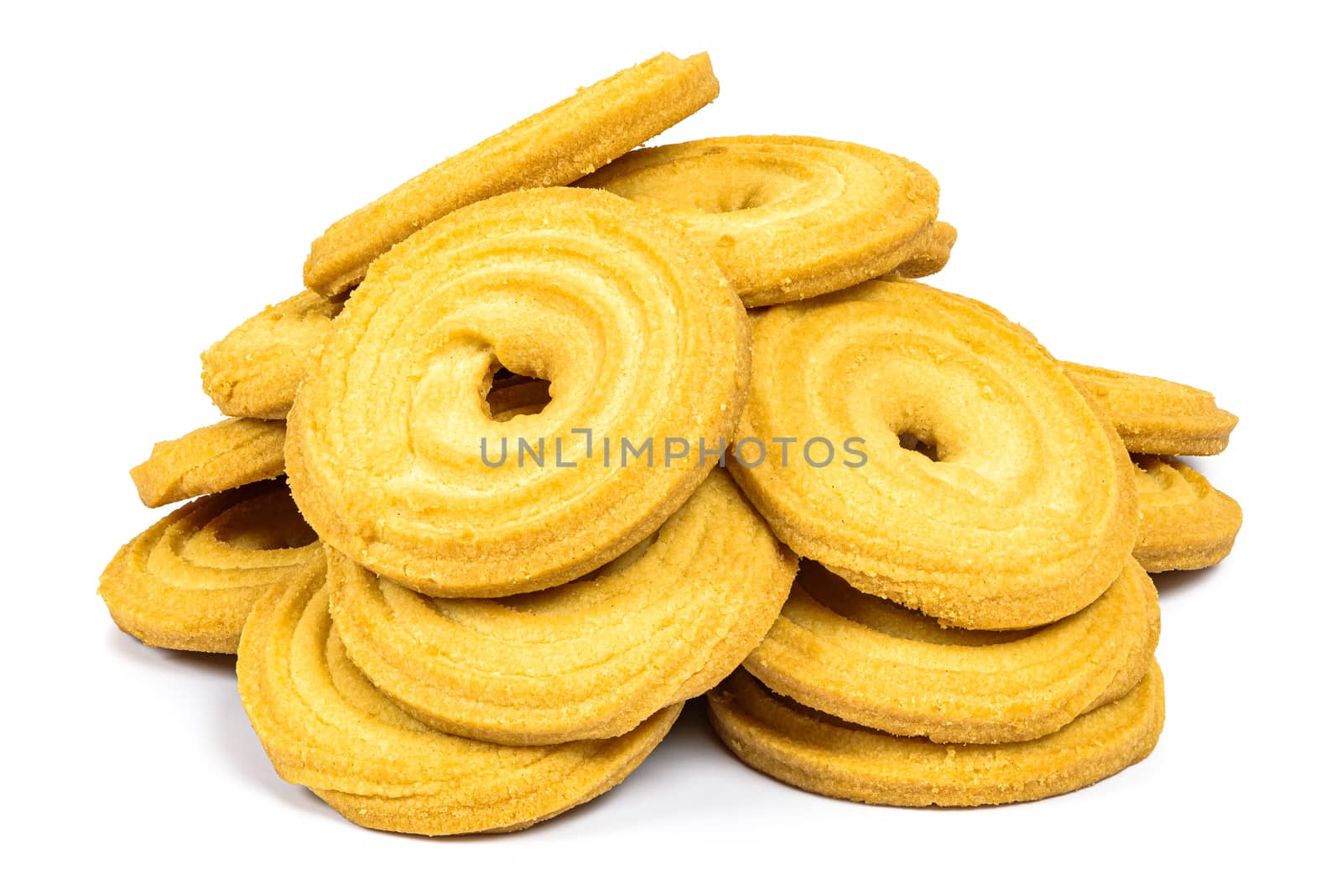 Heap of butter cookies isolated on white background with clipping path