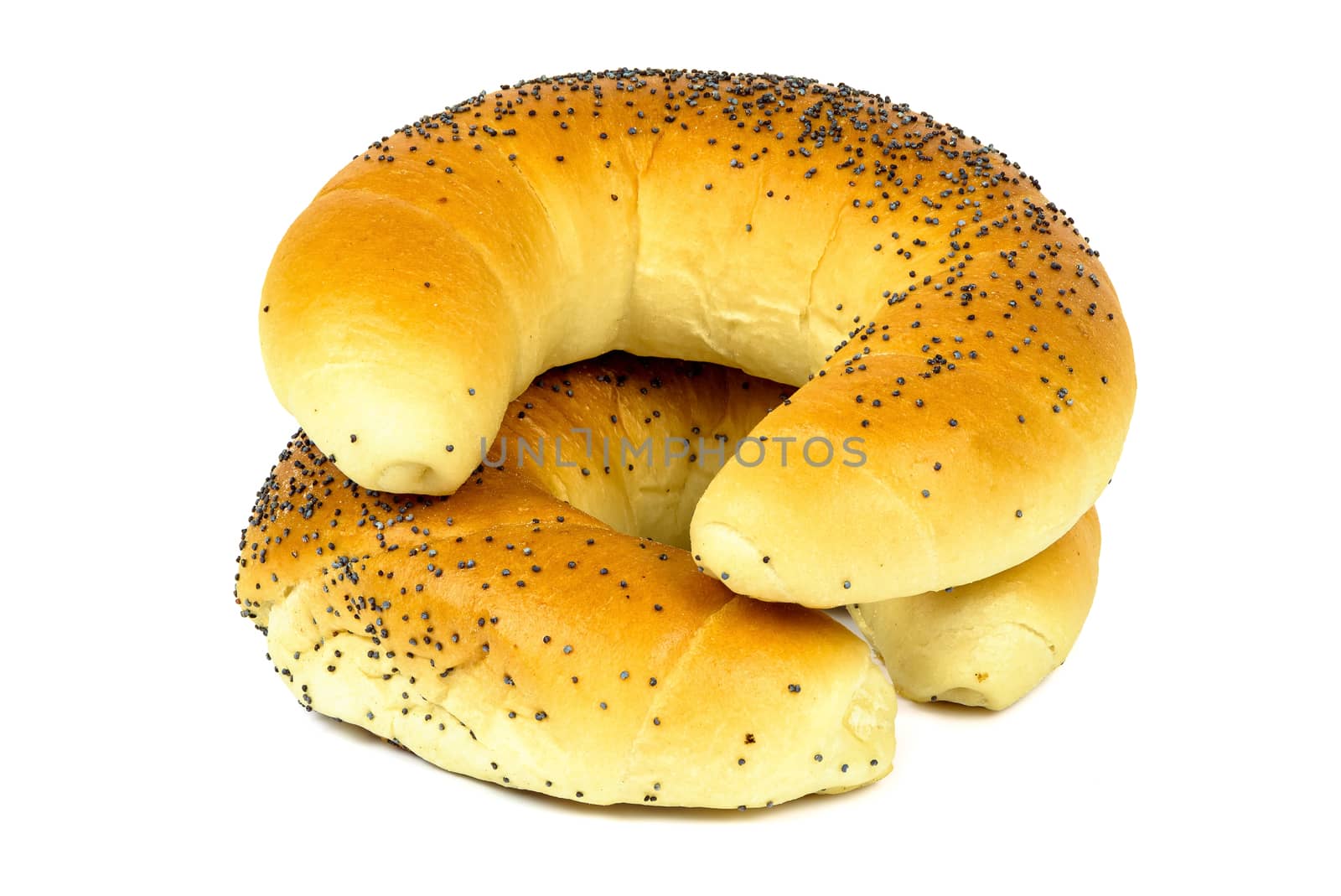 Crescent rolls with poppy seeds isolated on white background with clipping path