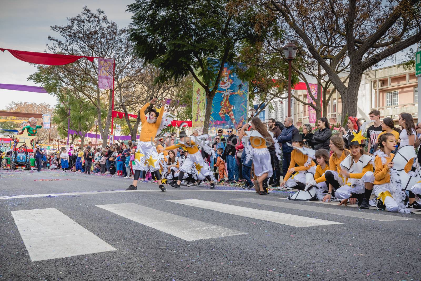 dancers parading in the street in carnival of Loule city, Portug by AtlanticEUROSTOXX