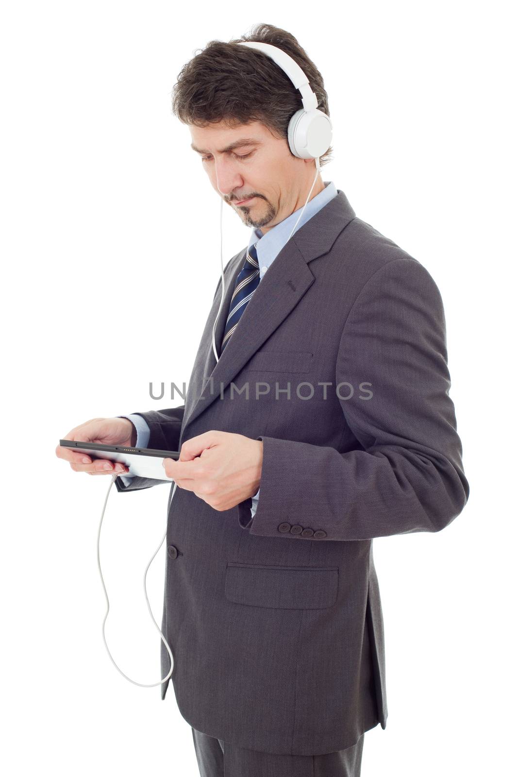 businessman with tablet pc and headphones, isolated