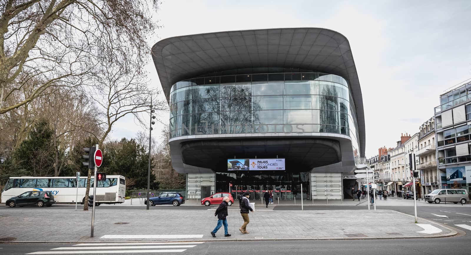 people passing the city convention center of Tour, France by AtlanticEUROSTOXX