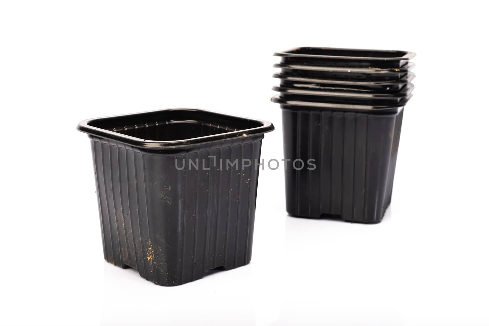 used black plastic gardening bucket  by AtlanticEUROSTOXX