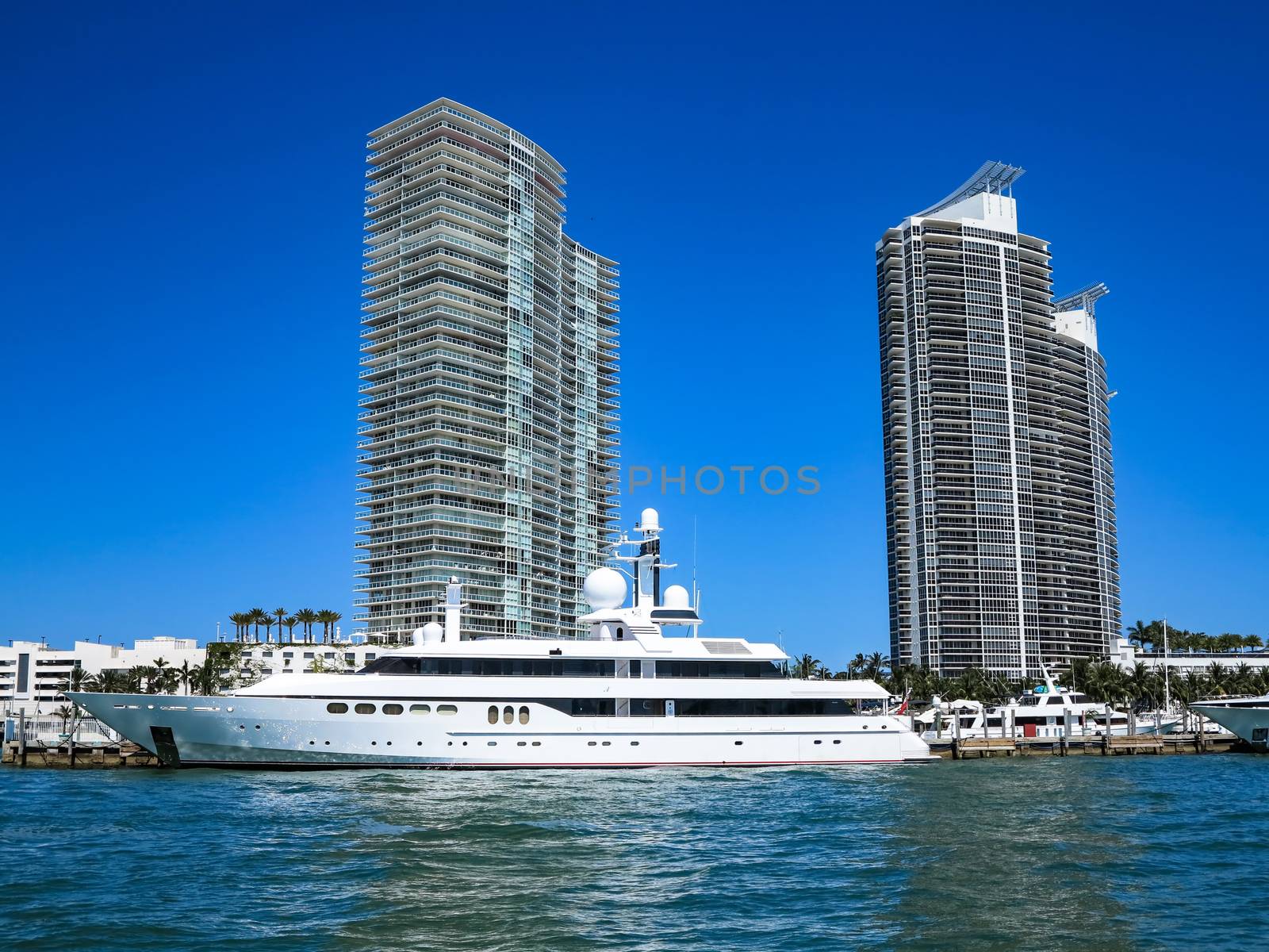 A large yacht and 2 modern buildings