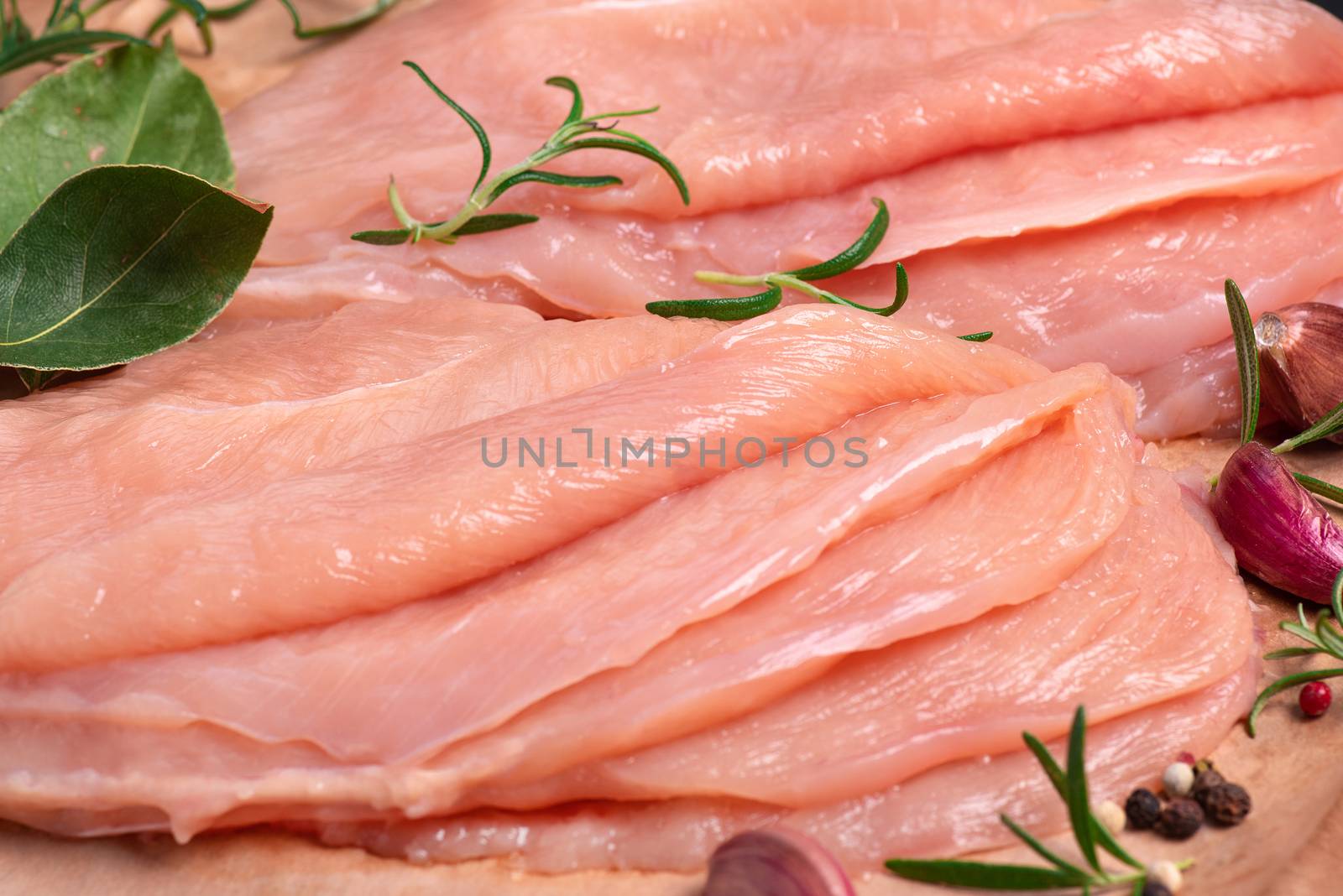 Raw sliced chicken meat close-up. Close-up view of raw, fresh, choped and sliced chicken meat.Sotilissimo. Delicious dietary meat. Cooking. by nkooume
