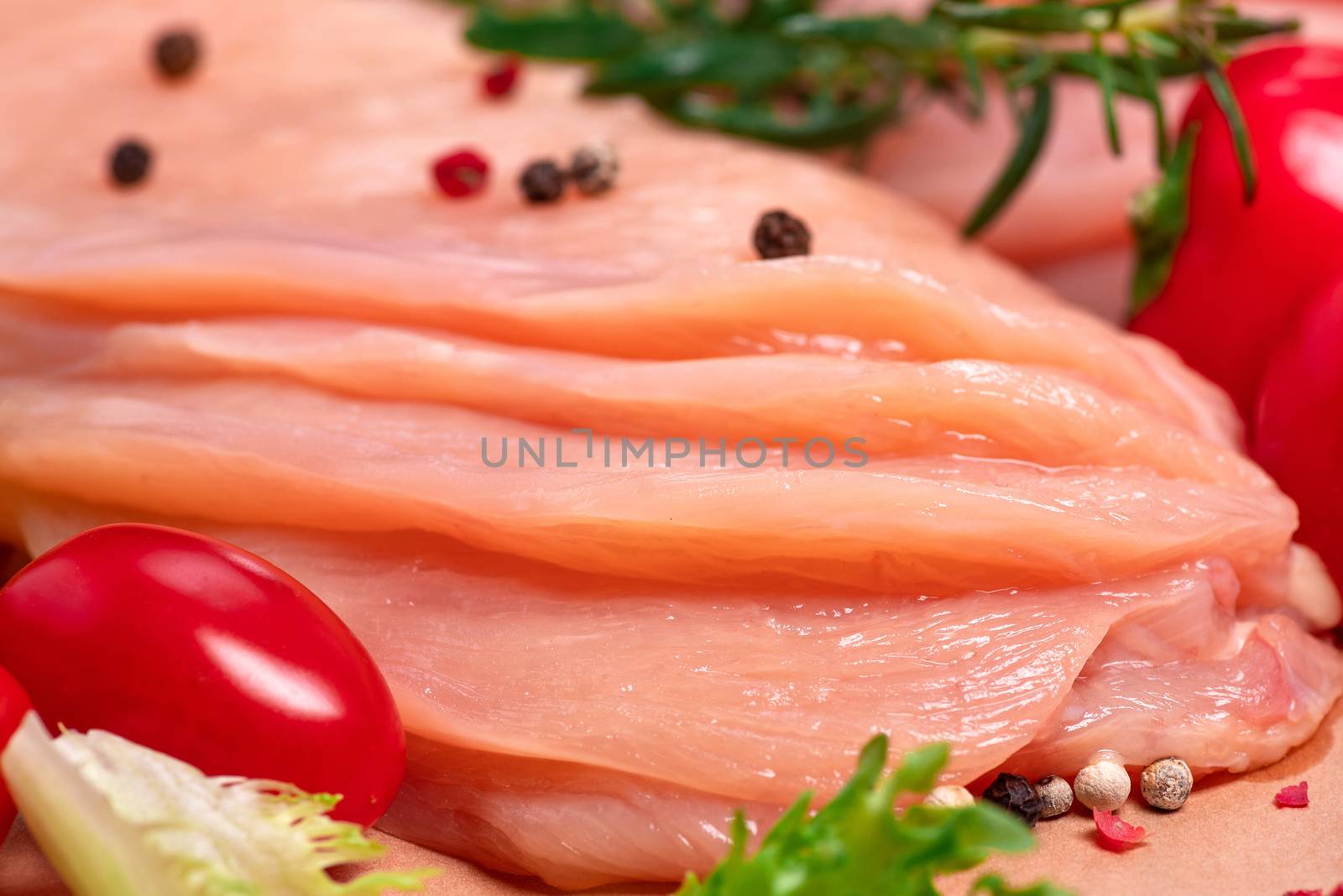 Raw sliced chicken meat close-up. Sotilissimo. Close-up view of raw, fresh, choped and sliced chicken meat.Delicious dietary meat. Cooking. by nkooume