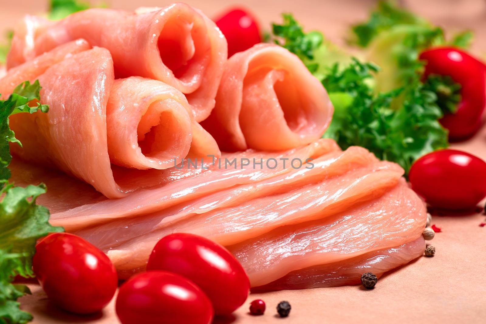 Raw sliced chicken meat close-up. Sotilissimo. Close-up view of raw, fresh, choped and sliced chicken meat.Delicious dietary meat. Cooking. by nkooume