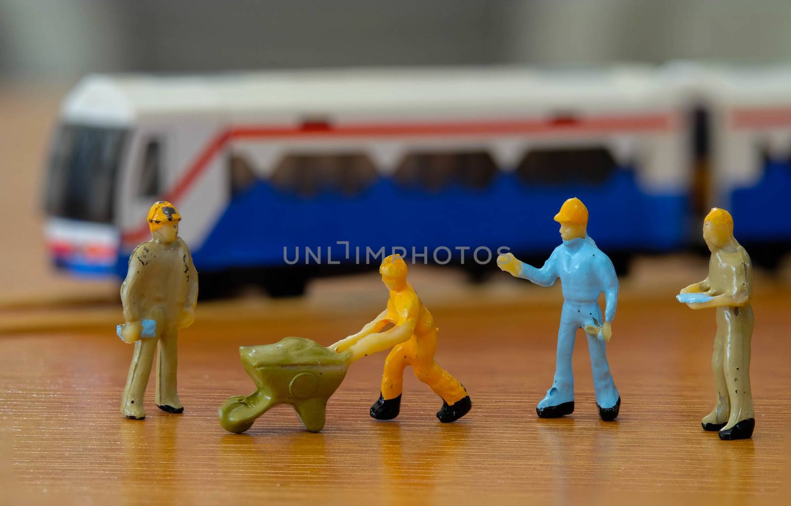 group of miniature Worker meeting to repair The  Train  by Bonn2210