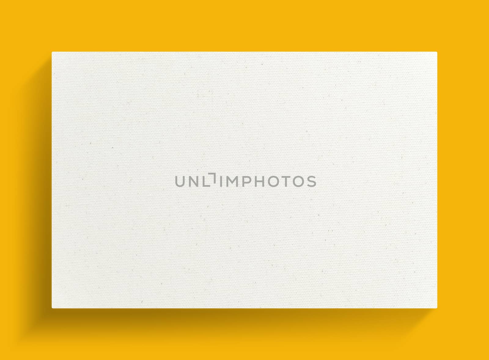 White canvas frame on yellow background with soft shadow.