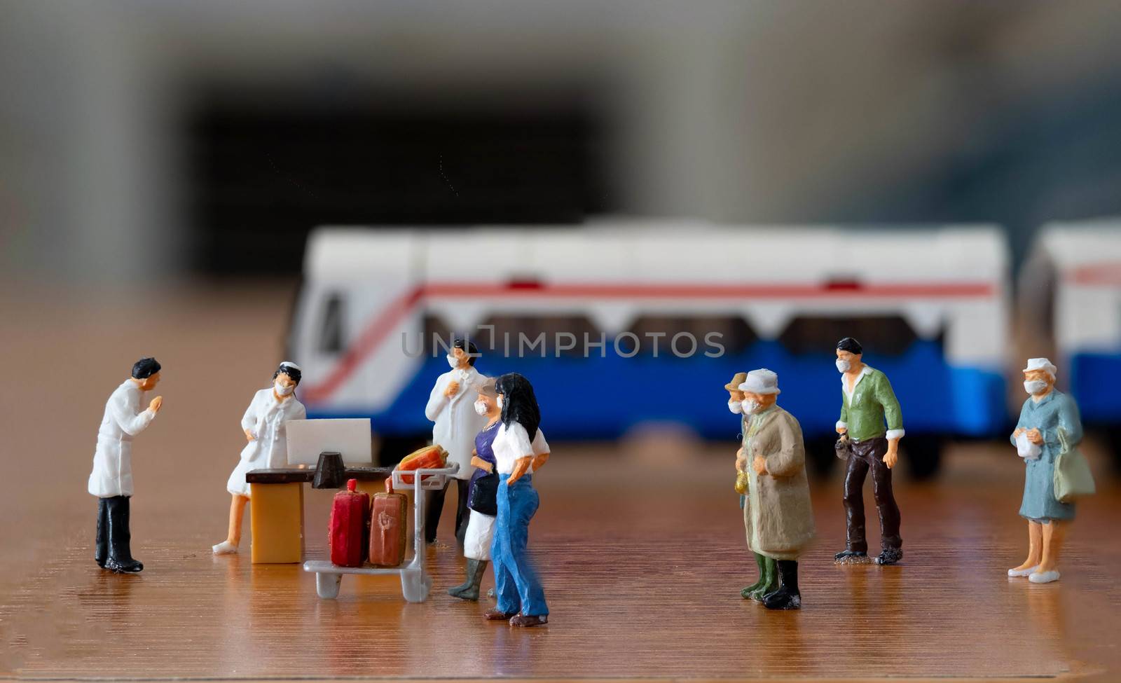miniature figure doll passenger in train Station wearing mask to by Bonn2210