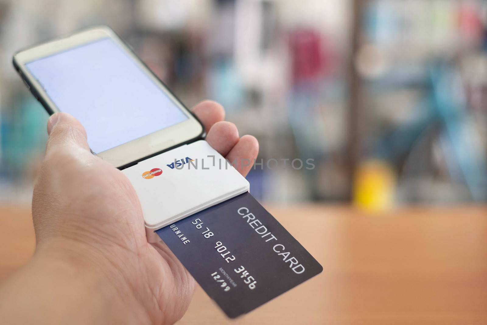 pay for product and service by credit card on Mobile Phone by Mobile Credit card swipe machine