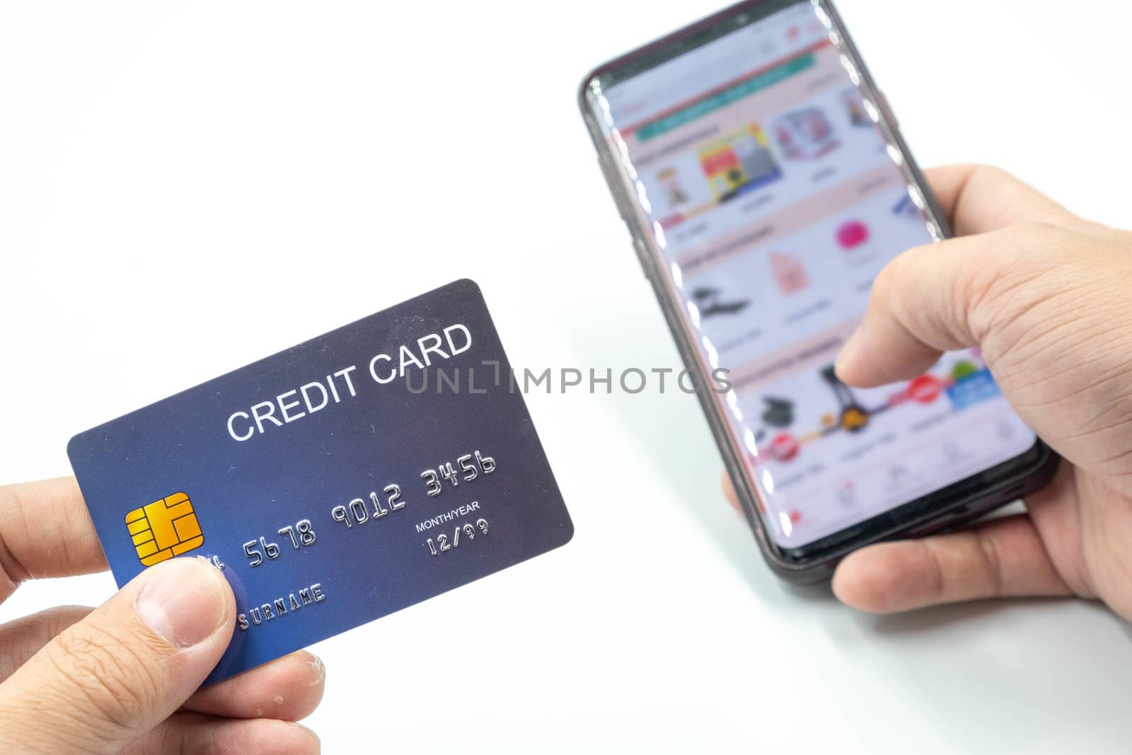 The photo of mobile phone open shopping app and credit card for shopping online concept