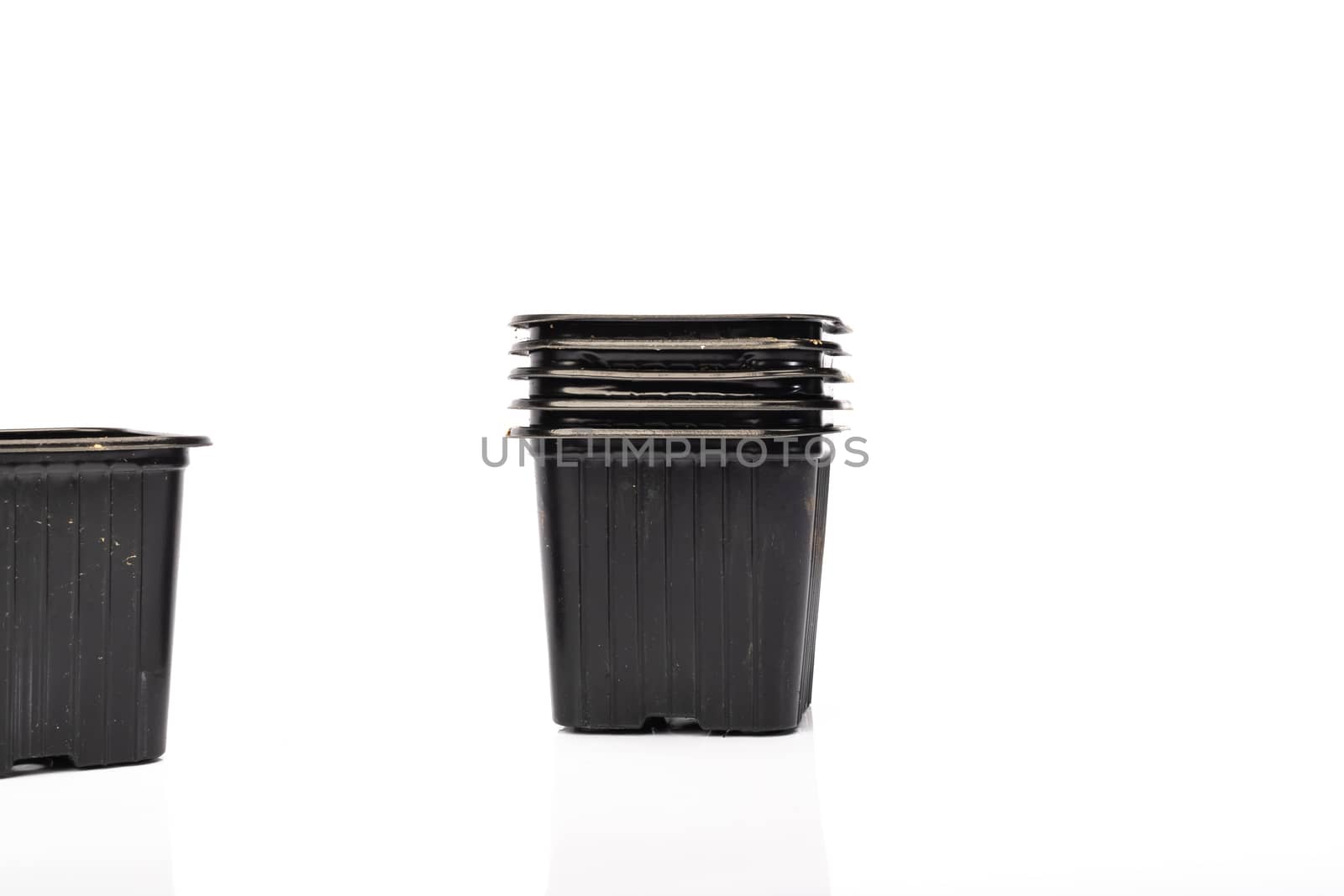 used black plastic gardening bucket  by AtlanticEUROSTOXX