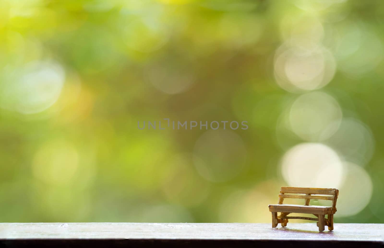 The wooden bench with Green Tree Bokeh in the Background for wal by Bonn2210