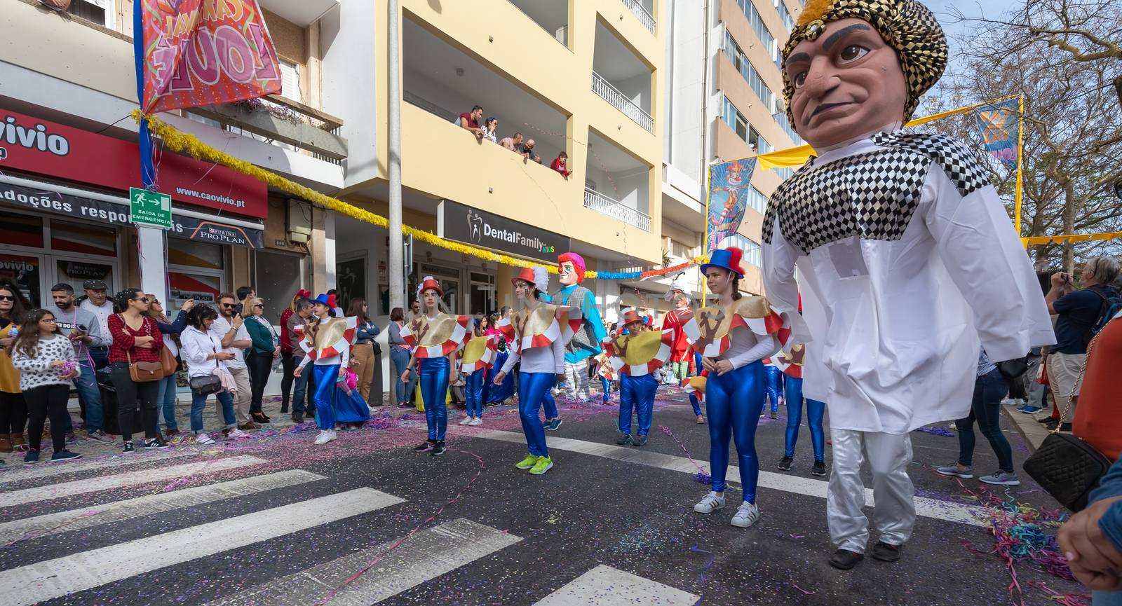 dancers parading in the street in carnival of Loule city, Portug by AtlanticEUROSTOXX