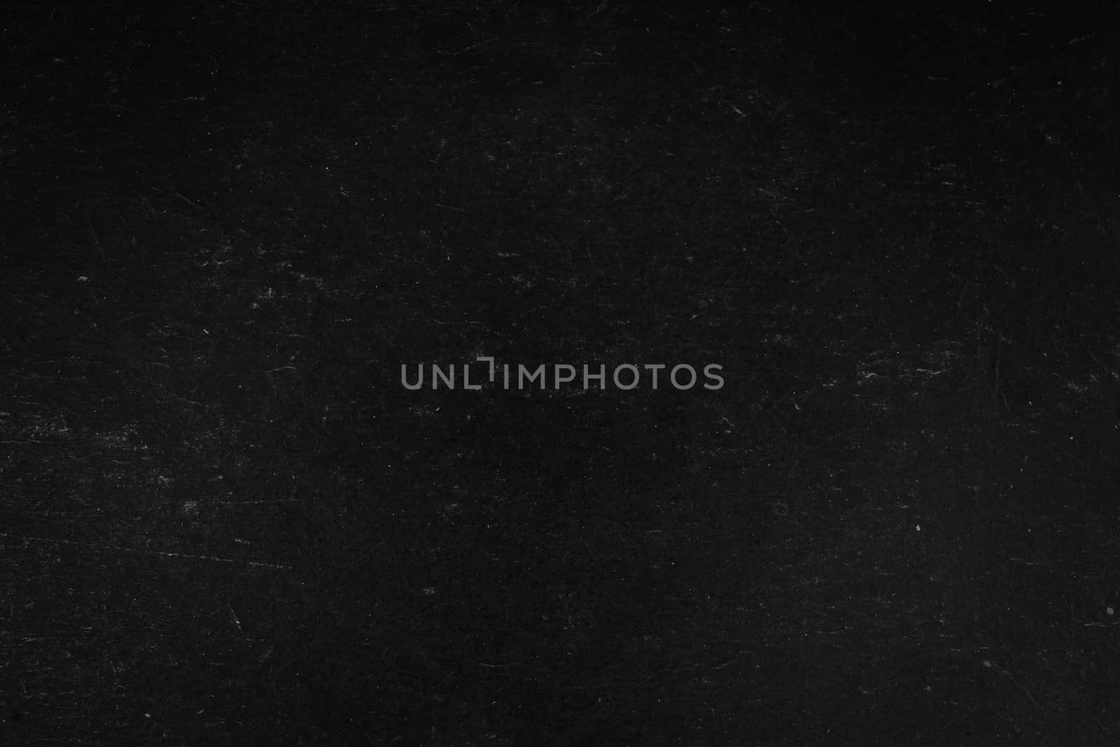 Black paper background used for text.