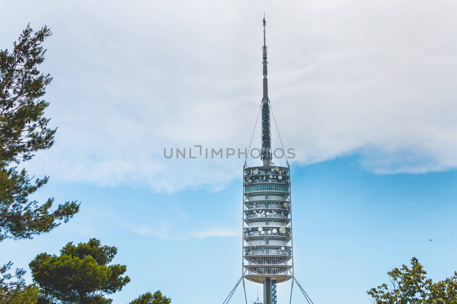 Barcelona, Spain - June 21, 2017: View of the Collserola telecommunications tower on the heights of Barcelona on a summer day