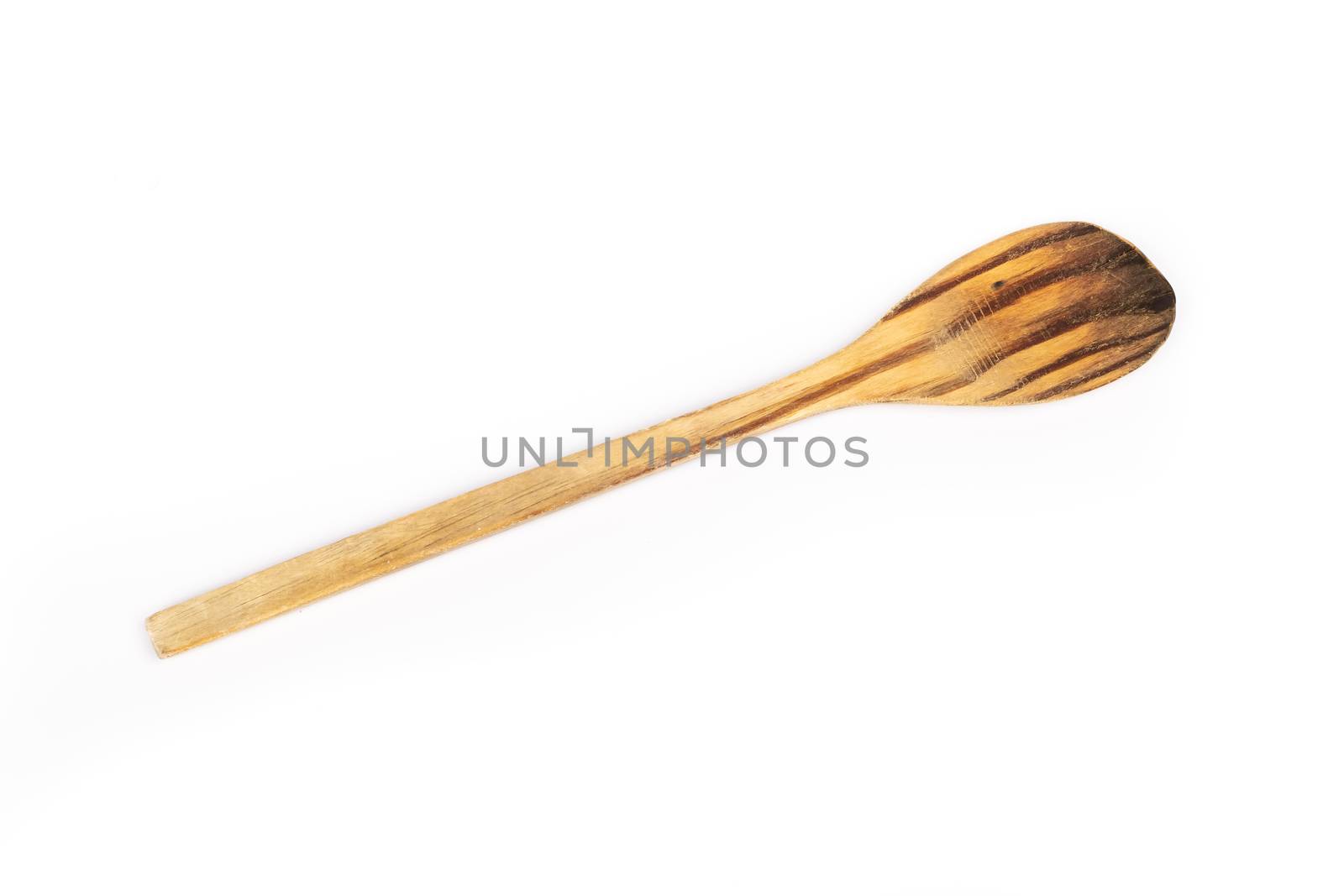 wooden kitchen spoon on white background in studio