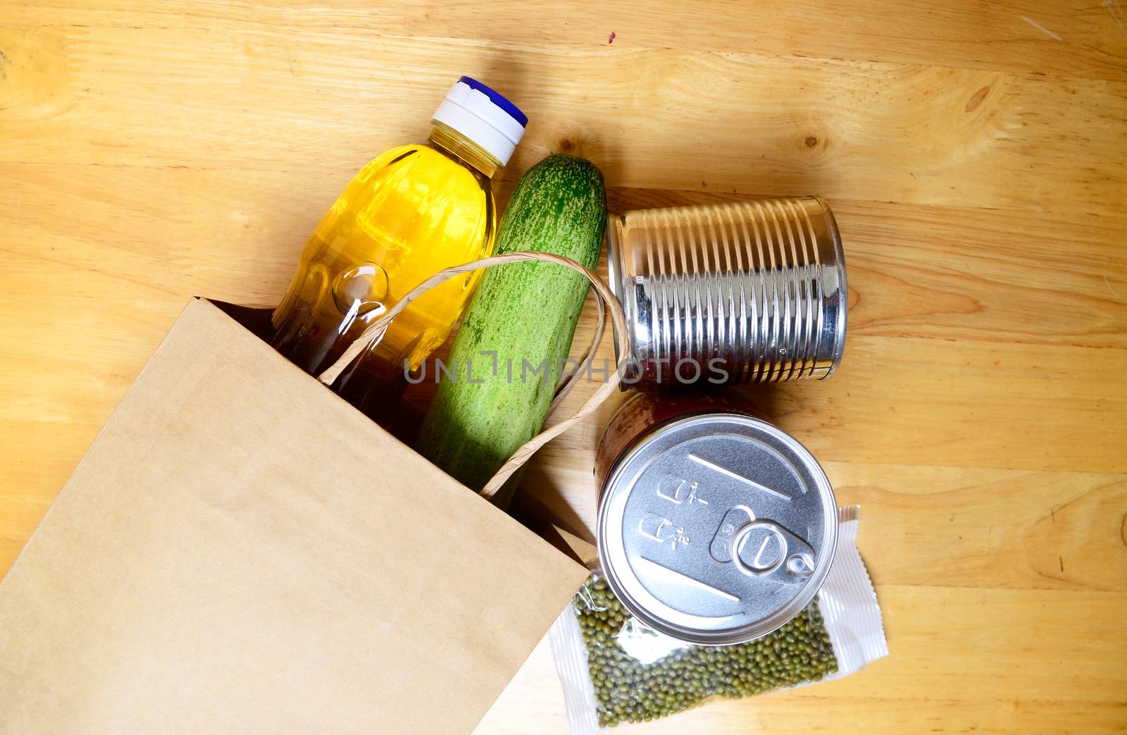 Food supplies crisis food stock for coronavirus quarantine isolation period on wooden background. Food delivery, Donation. top view. 