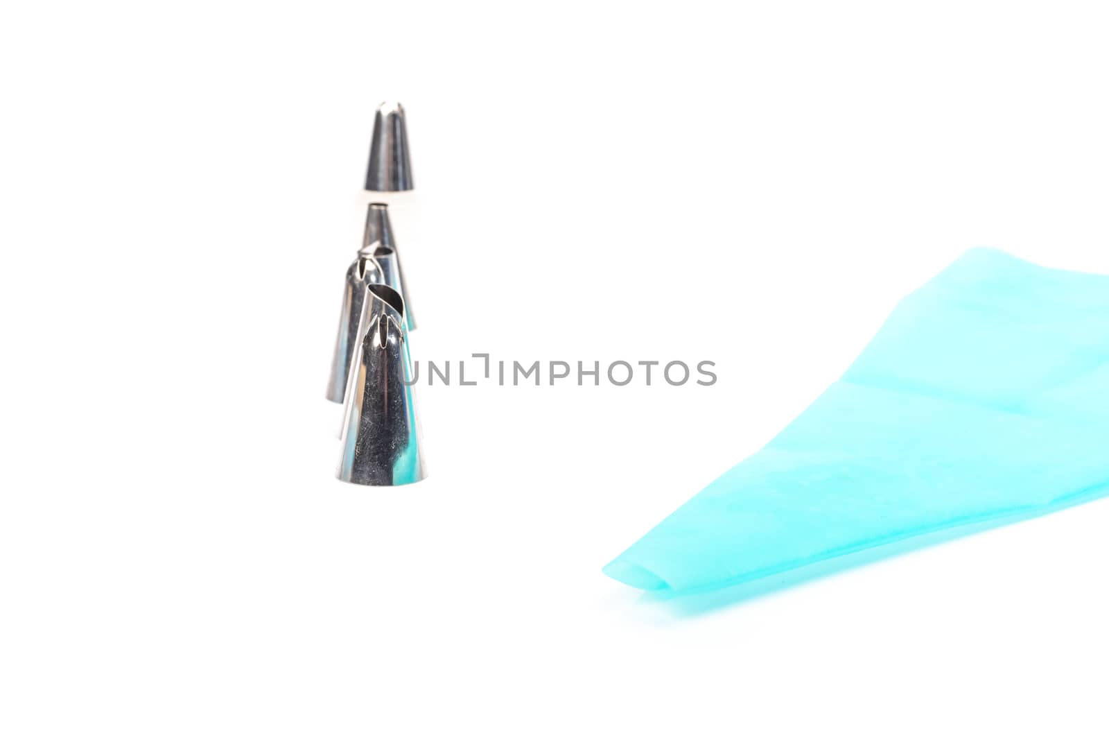 pastry bag and pastry accessories on white background by AtlanticEUROSTOXX