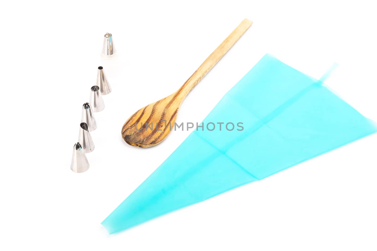 pastry bag and pastry accessories on white background by AtlanticEUROSTOXX