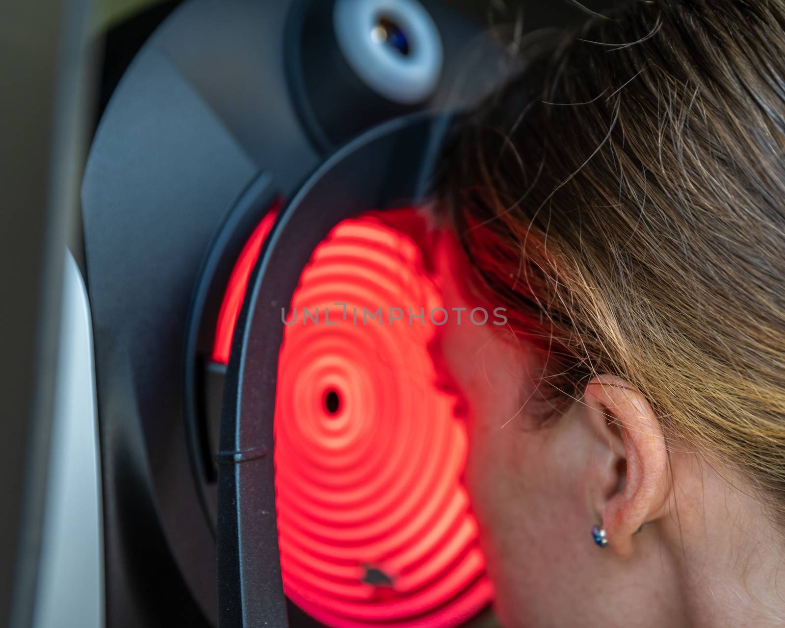 visual examination of the eyes of a young woman at the eye clinic by Edophoto