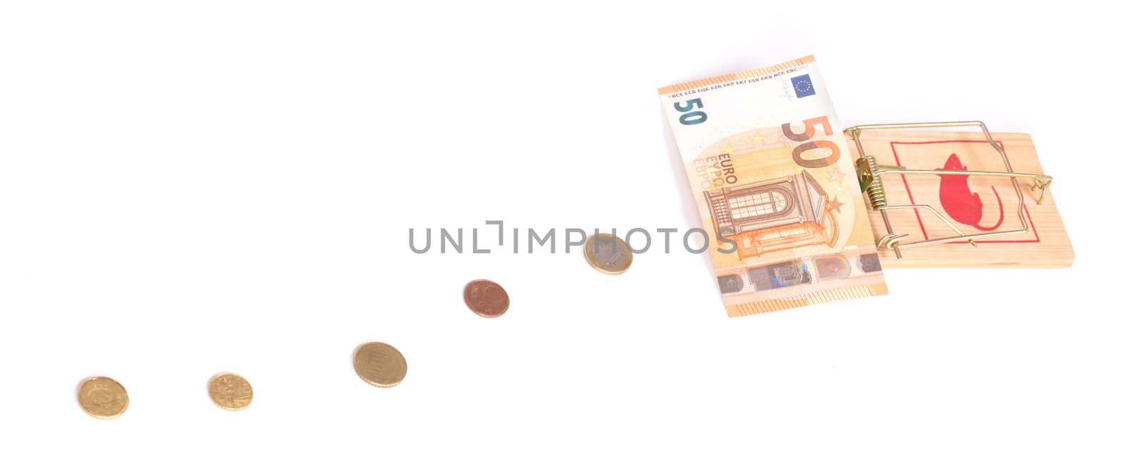 Money on the mousetrap, isolated on white