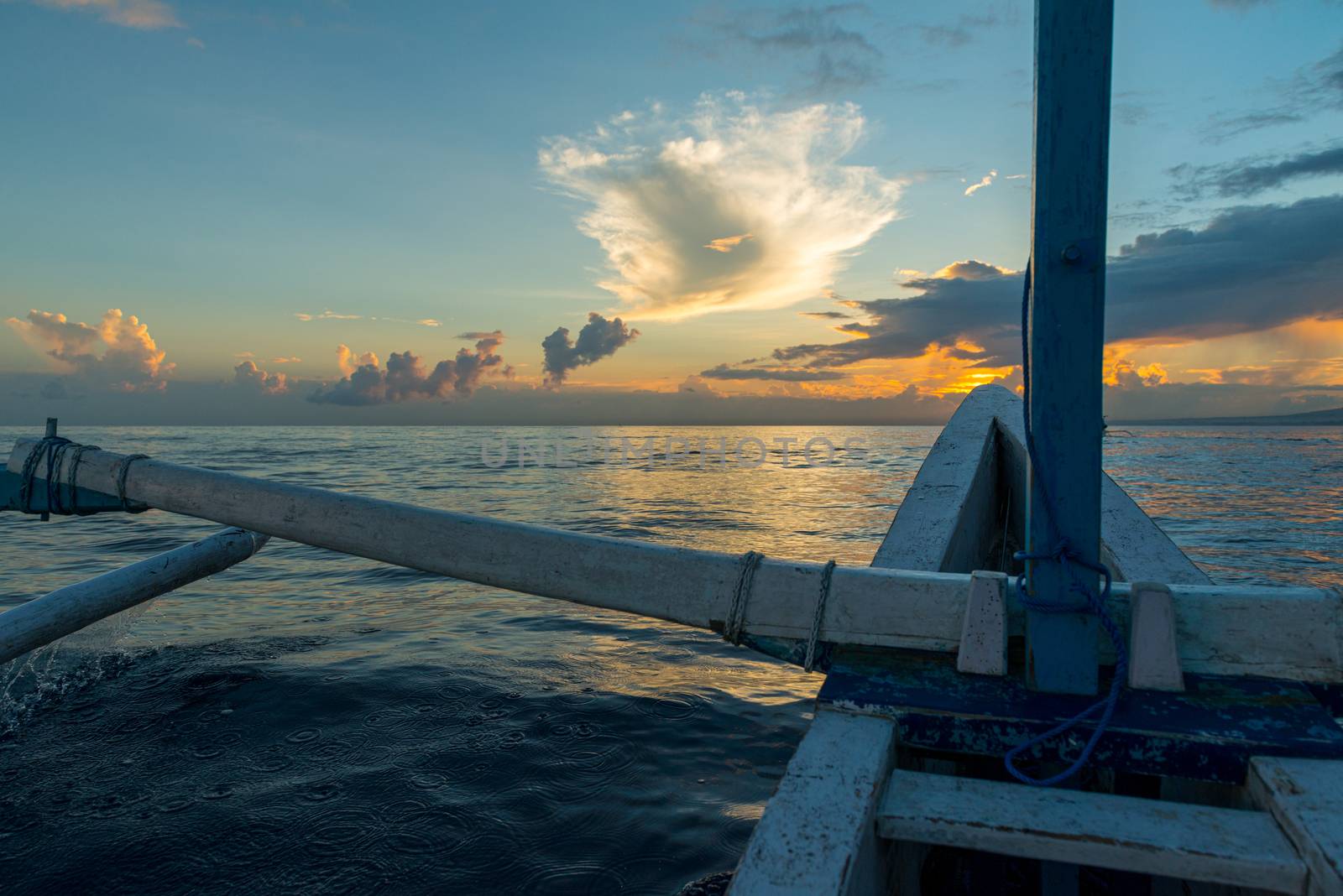 Sun rising ove Pacific ocean - view from the boat