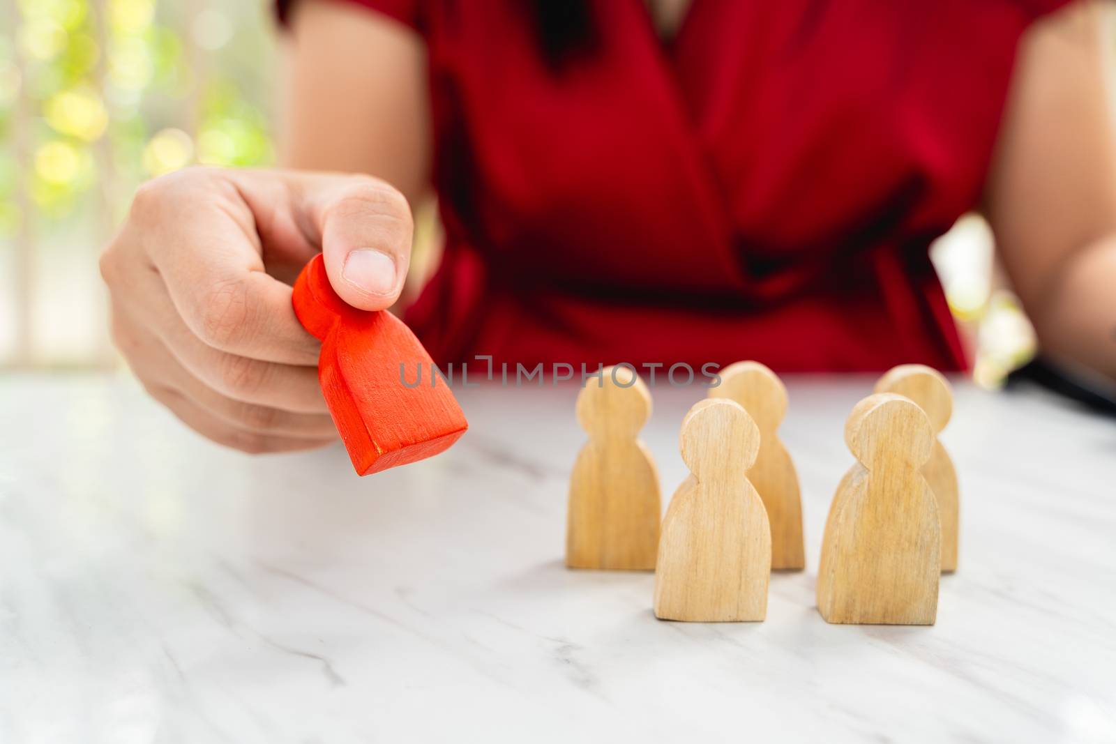 Figure in human resource management concept. The red wood figure by Boophuket