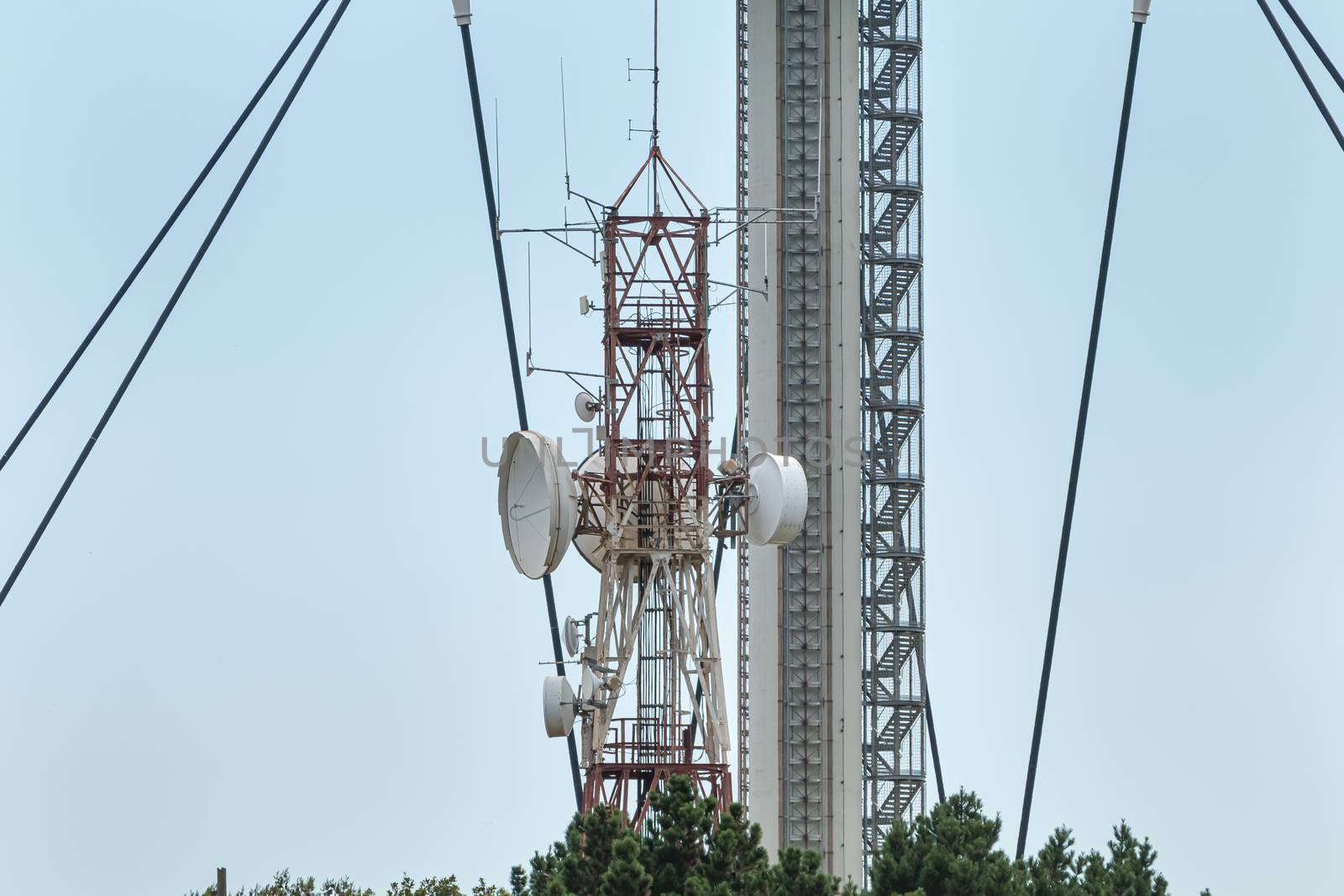 Barcelona, Spain - June 21, 2017: View of the Collserola telecommunications tower on the heights of Barcelona on a summer day