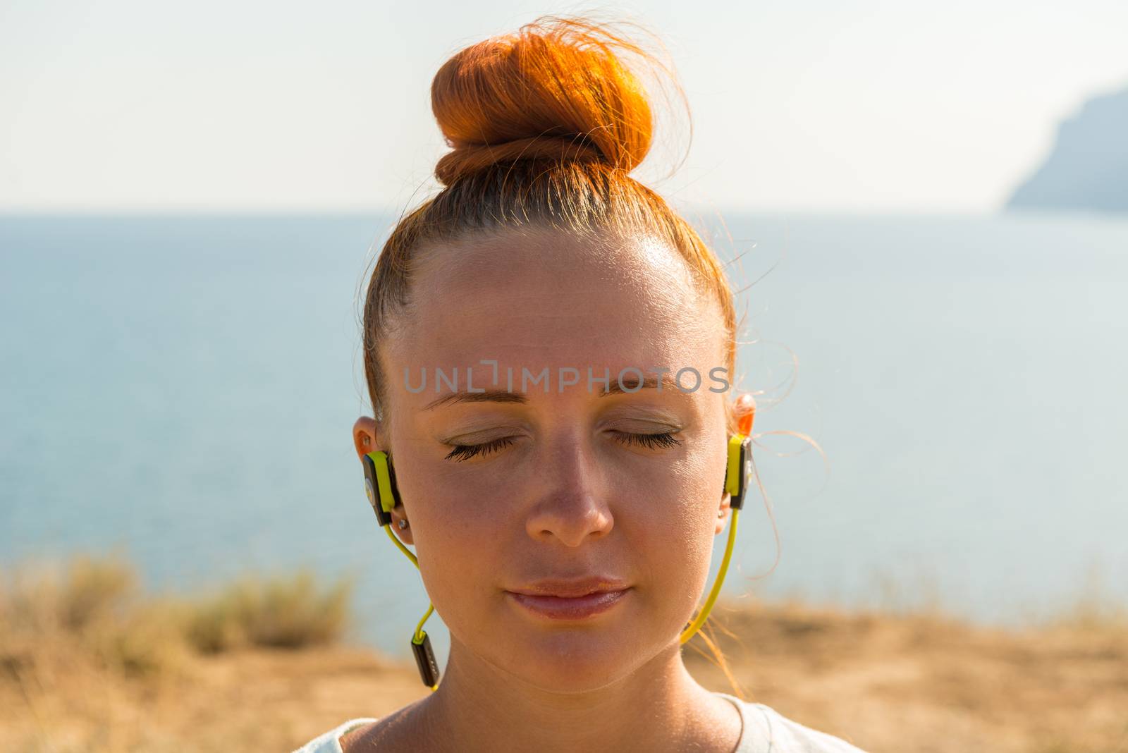 Fitness girl with wireless headphones by nikitabuida