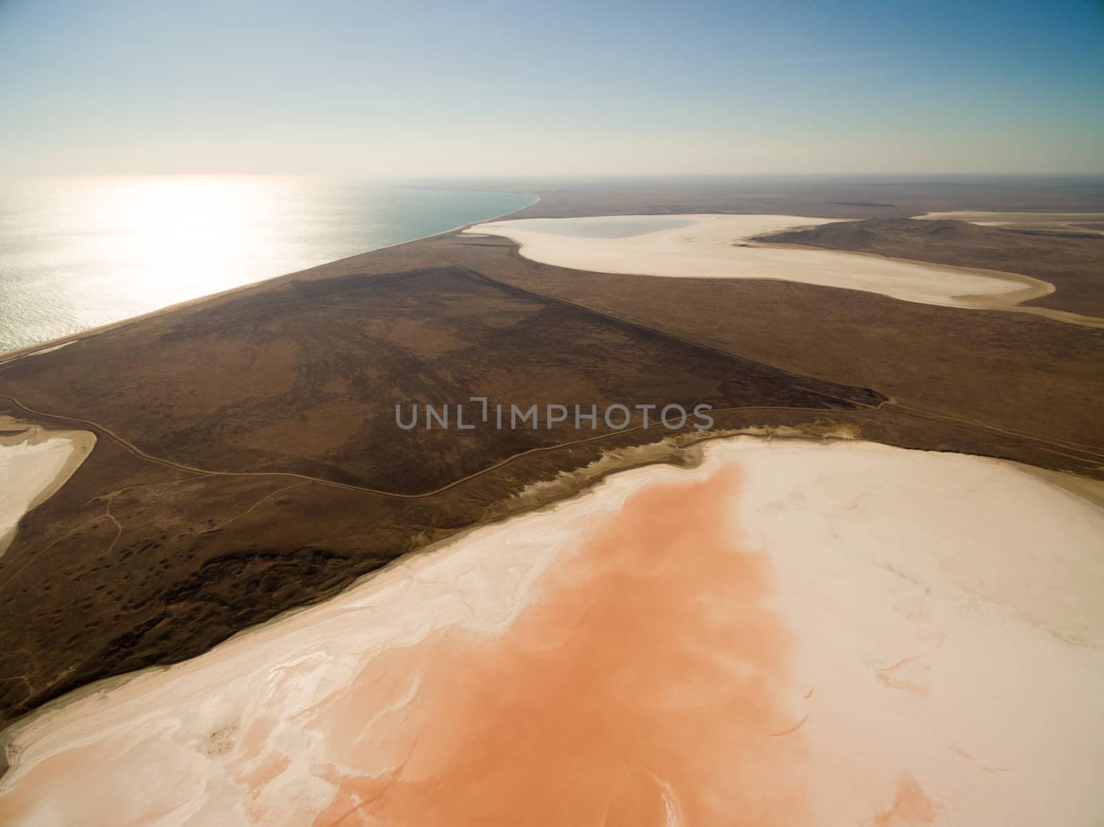 Aerial shot of Koyashskoe pink salt lake firth in Crimea