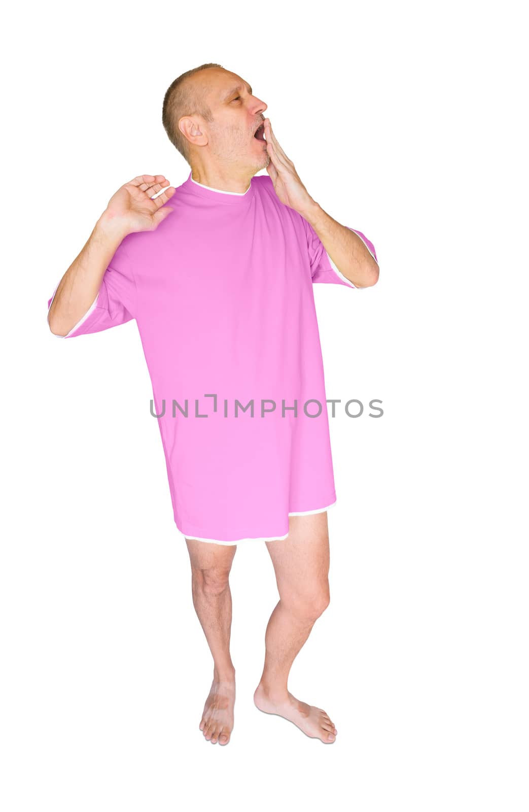 Man in pink nightdress, waking up and yawning, on white background